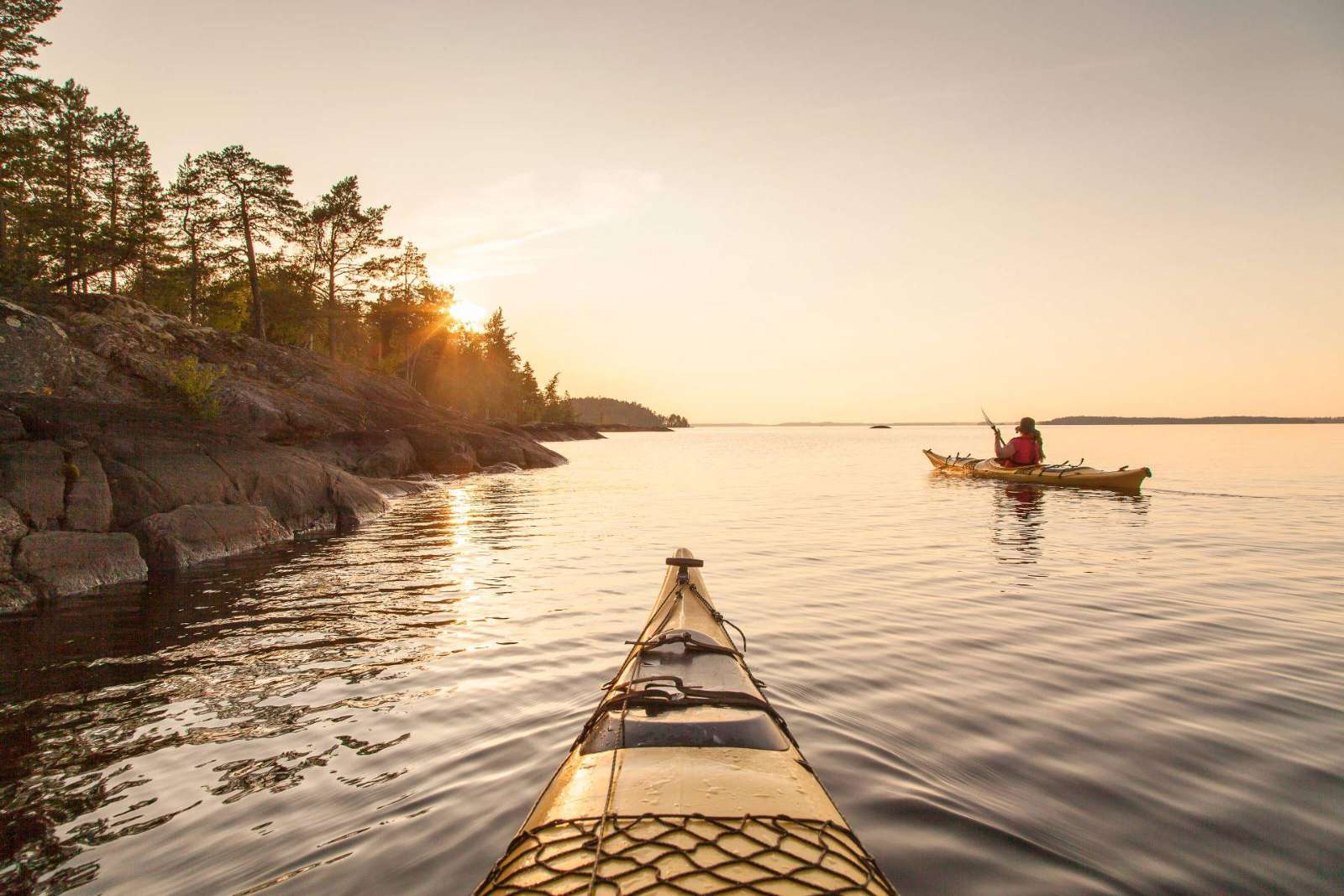 Kayaking on Lake Saimaa at sunset