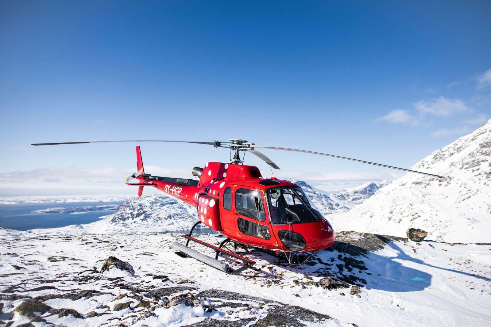 A helicopter over the Nuuk fjord, Greenland