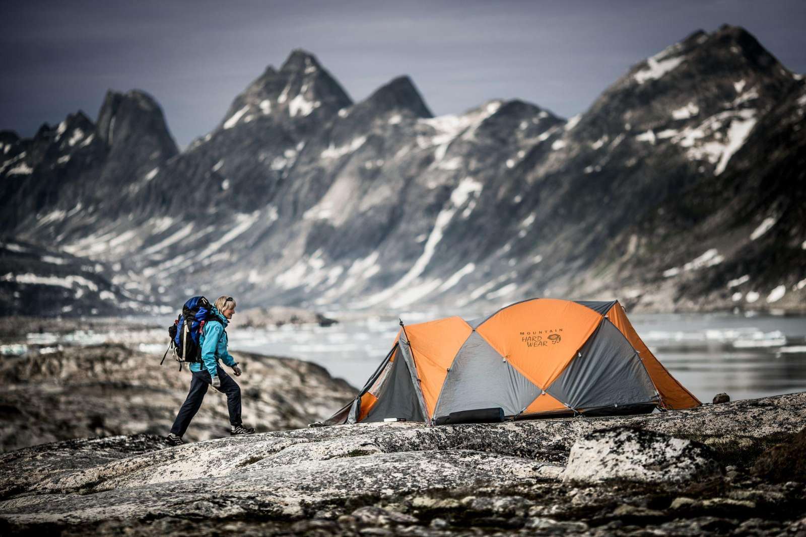 A hiker at a camp near Tasiilaq, East Greenland