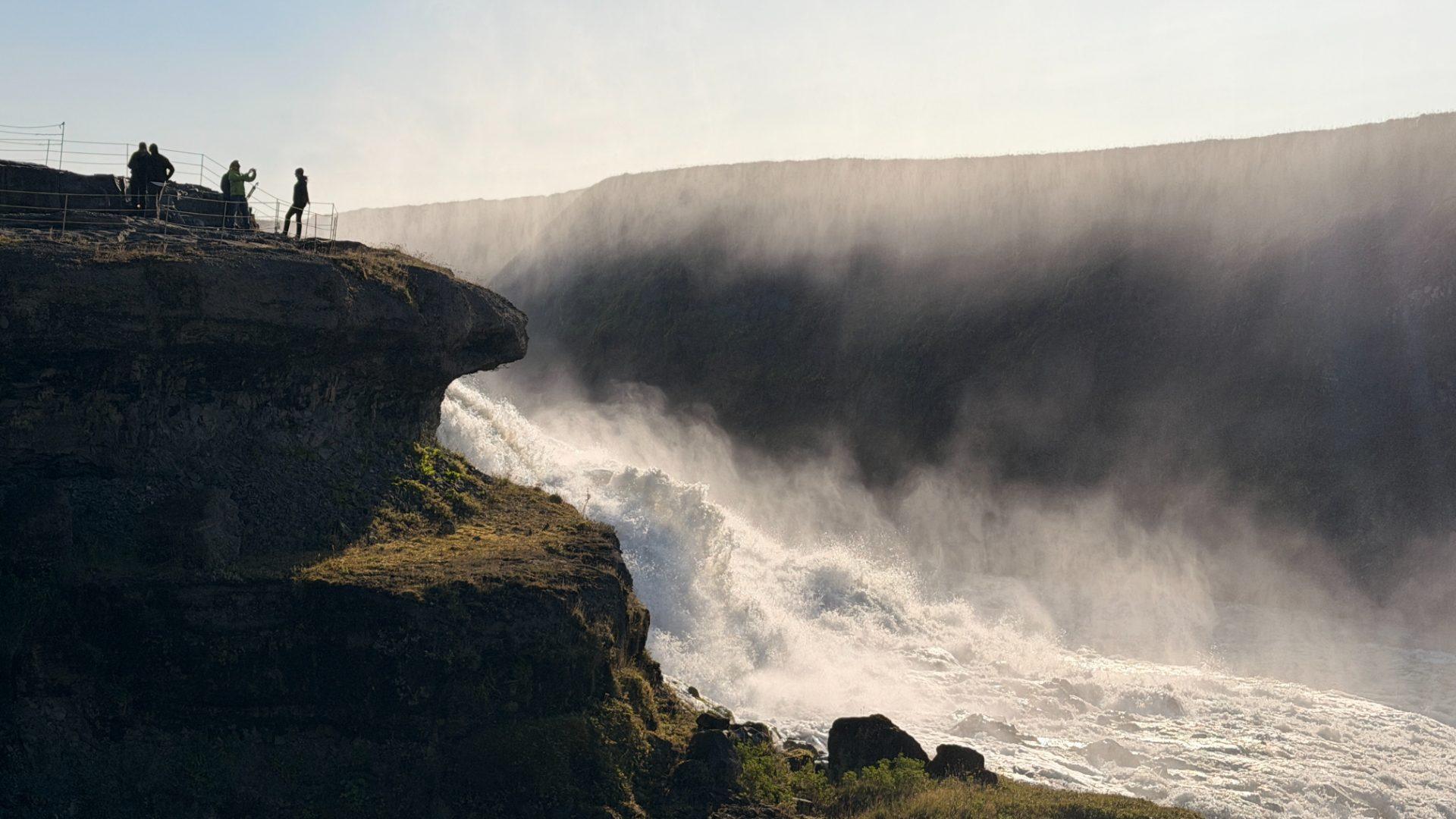 Visitors on the viewing platform above the Gullfoss falls, Iceland