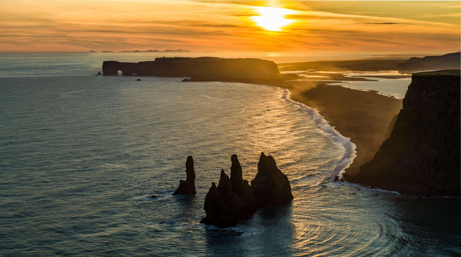 The Reynisdrangar sea stacks at sunset on Iceland’s south coast