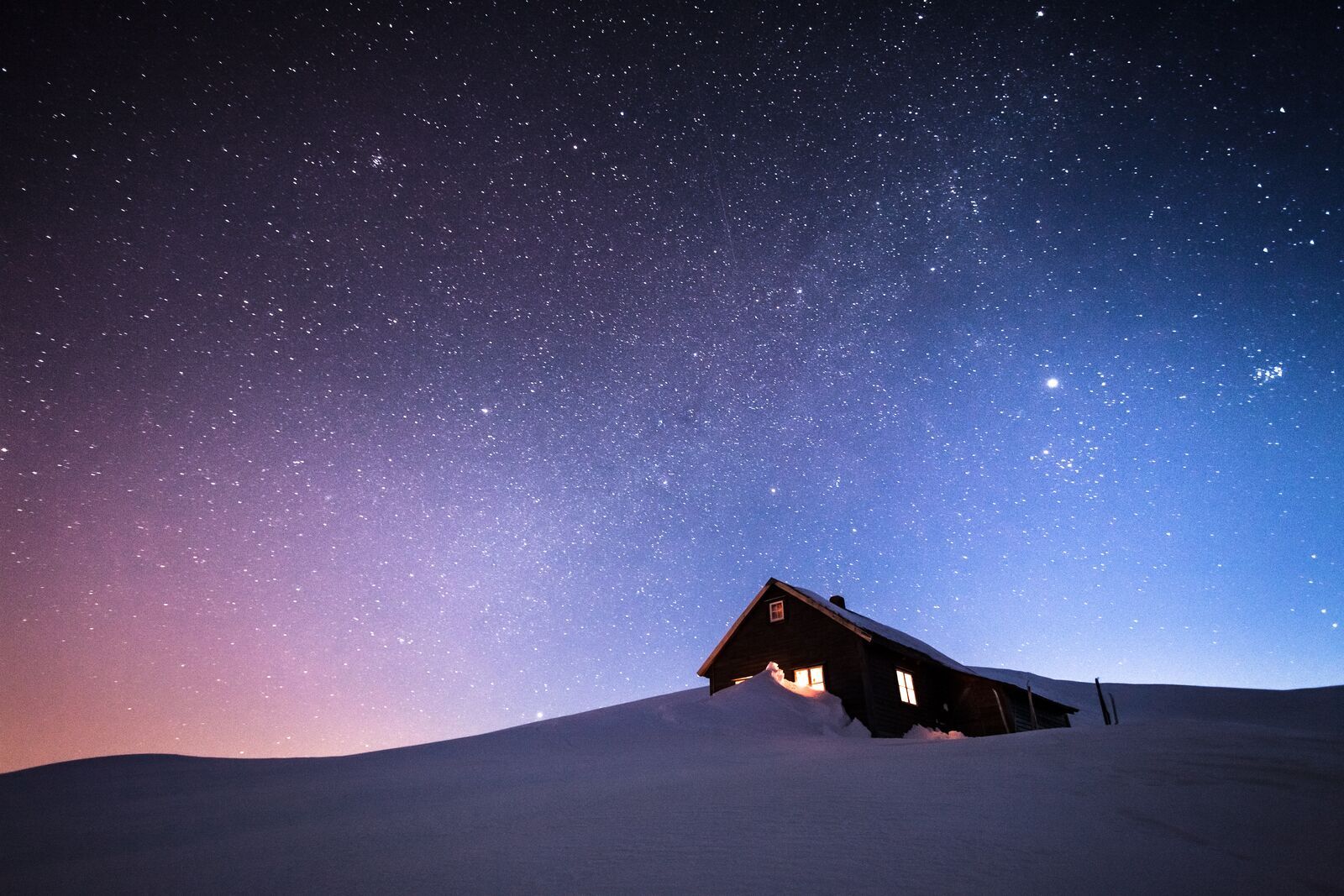 A Norwegian cabin under the night sky