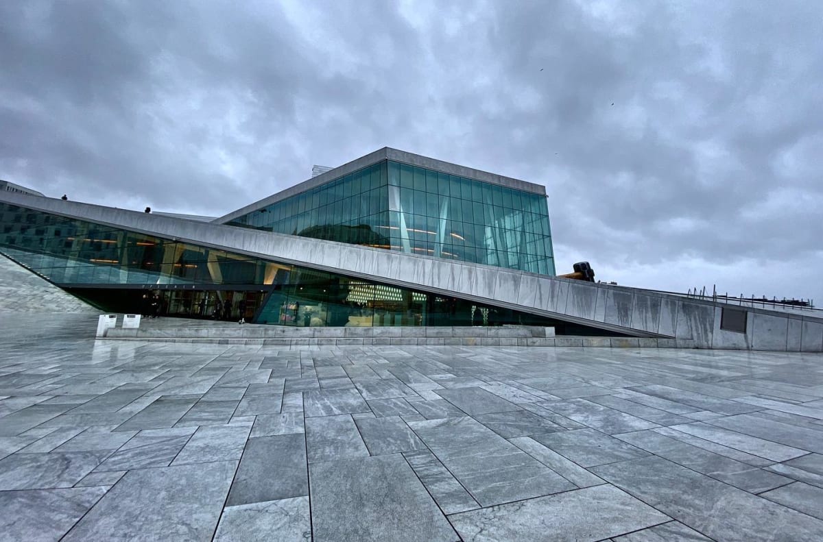 The Opera House on the Oslo waterfront under cloud
